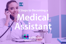 Young woman in scrubs working at front desk in hospital